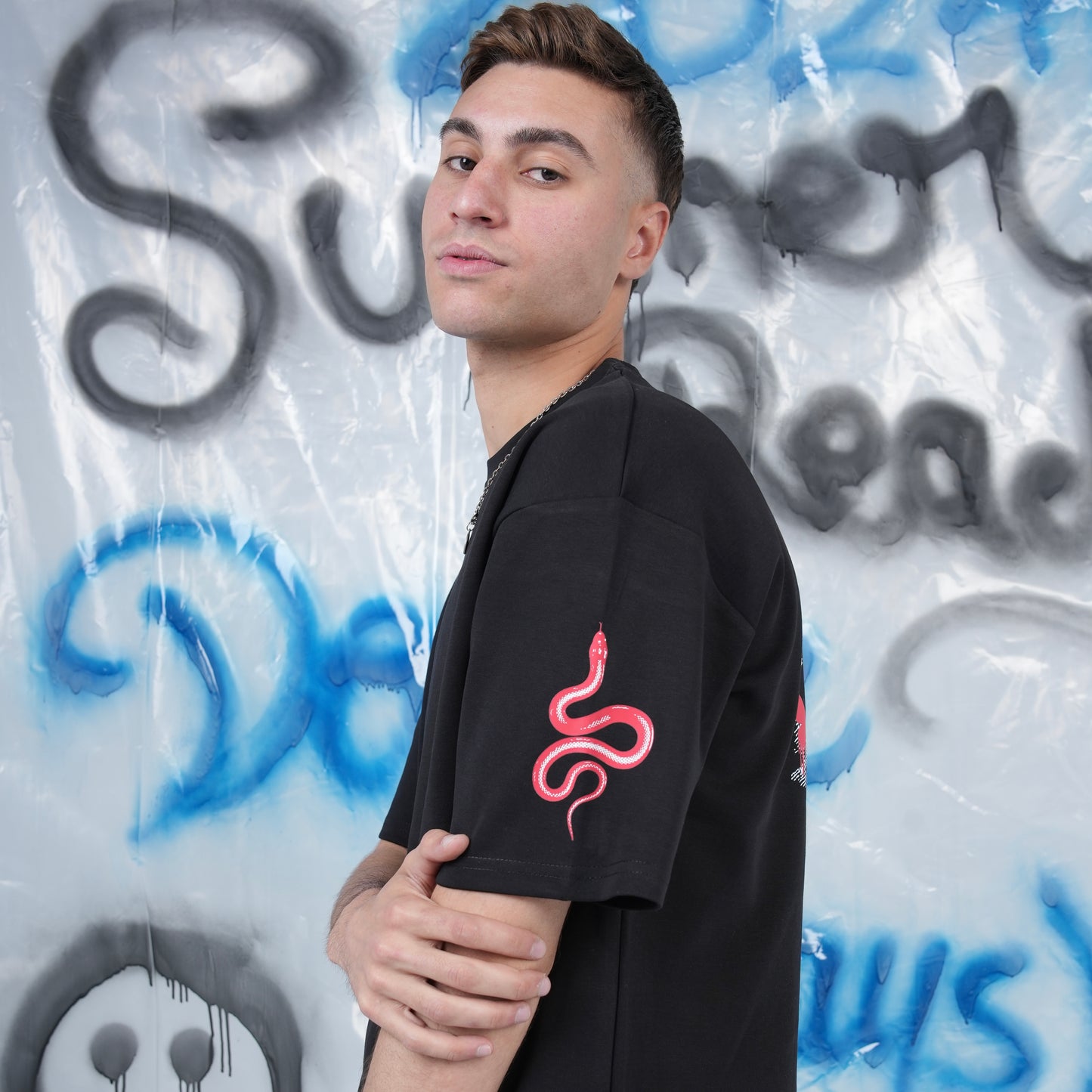 “LOVE WILL HAVE ITS SACRIFICES” Printed Oversized Tee - Denjoe